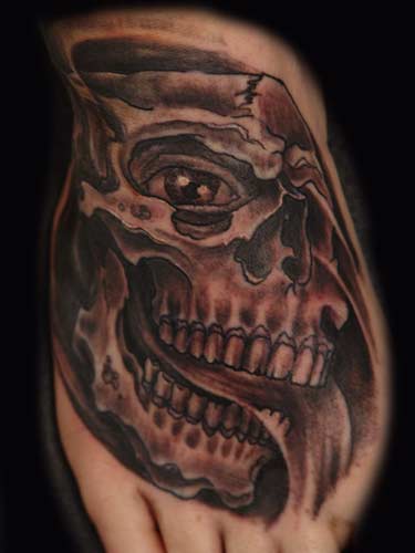 Tattoos - skully on the footy - 26441