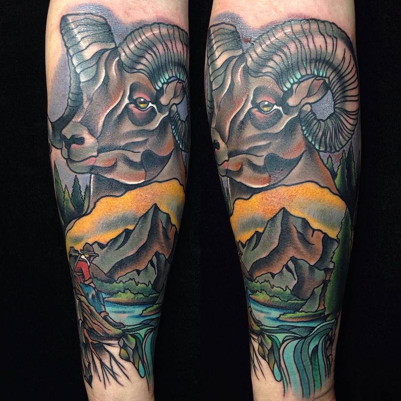 Traditional color mountain sheep, with mountain scenery tattoo. Gary