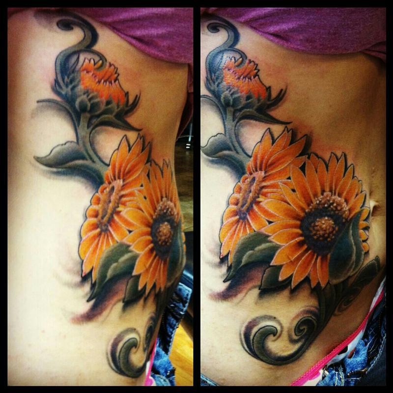 colored sunflower cover up tattoo by Tim Mcevoy TattooNOW