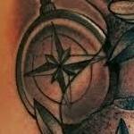 Black and Gray traditional compass with flowers tattoo. Frichard Adams Art Junkies Tattoo  Tattoo Thumbnail