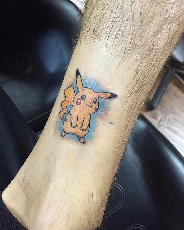 Small fun Pikachu from Pokemon by Capone Tattoos