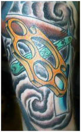 Brass Knuckles Straight Razor Tattoo