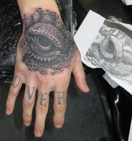 Jeff Mansolf - Bearded Dragon Eye Hand Tattoo