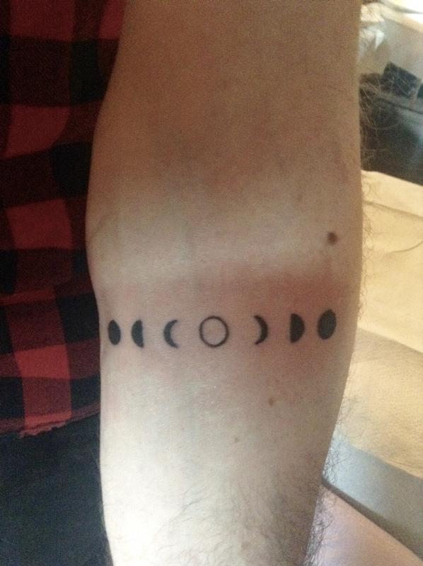 very small moon phases on forearm by Ben Licata: TattooNOW
