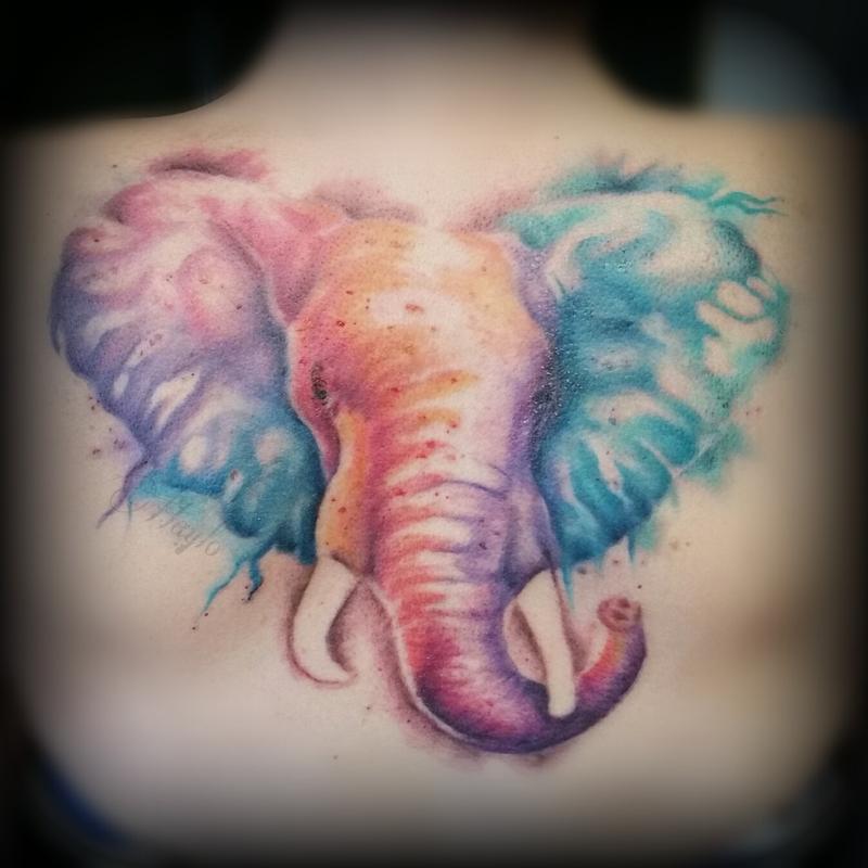 watercolor style elephant back piece by haylo tattoos watercolor style elephant back piece by haylo tattoos