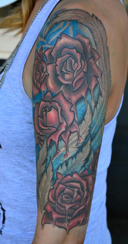 Jeff Johnson Wing and Roses Tattoo
