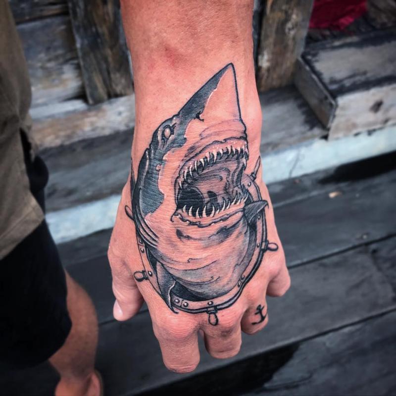 Great white shark on hand by Jeff Norton Tattoos