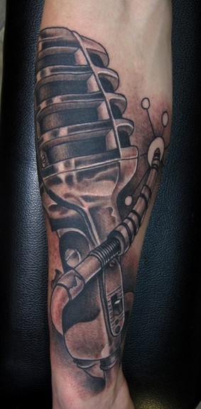 Grey Vintage Microphone Arm Tattoo Start To A Full Music Theme Sleeve