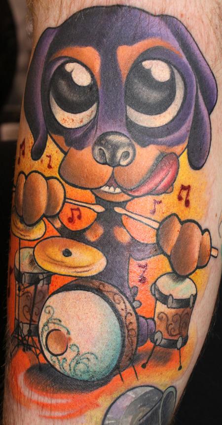 Looking for unique  Tattoos? Rottie Puppy playing drums