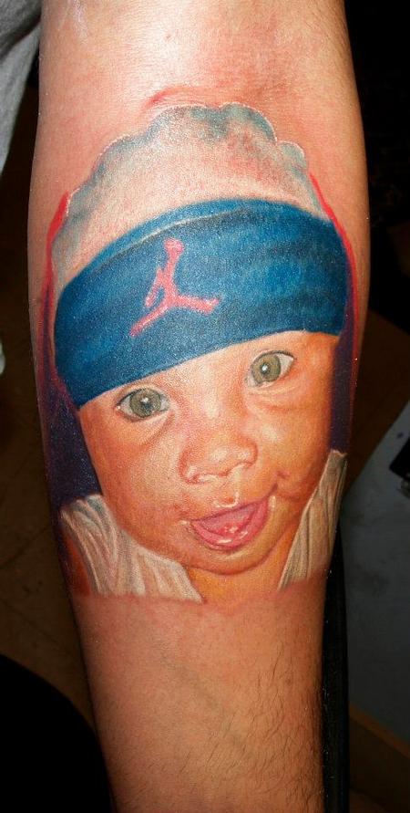 Cesar Perez Tattoos - baby color tattoo portrait