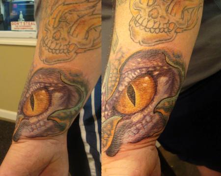 Cesar Perez Tattoos - lizard eye color tattoo