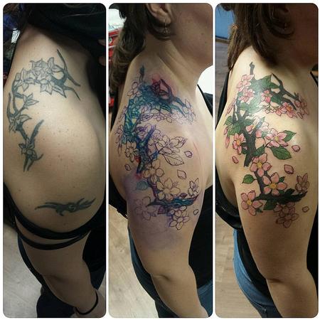 Linn - Cover-Up Tattoo of a Tribal with Cherry Flowers