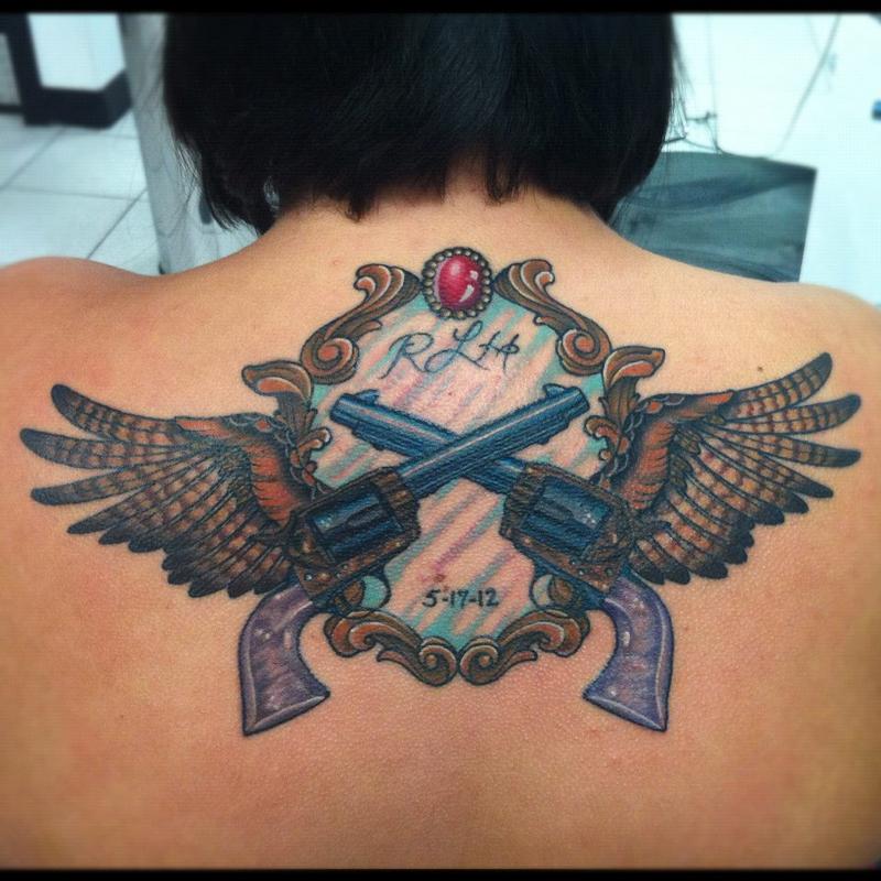 Pistols Guns Wings Tattoo by Nate Johnson Tattoos