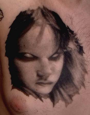 Paul Booth - Creepy black and gray girl portrait tattoo
