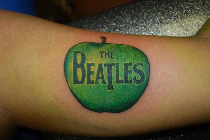 Beatles apple logo tattoo