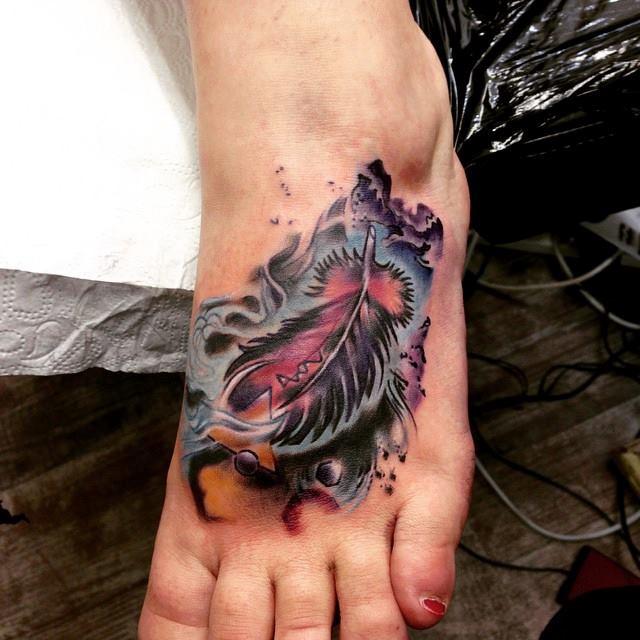 abstract watercolor feather tattoo