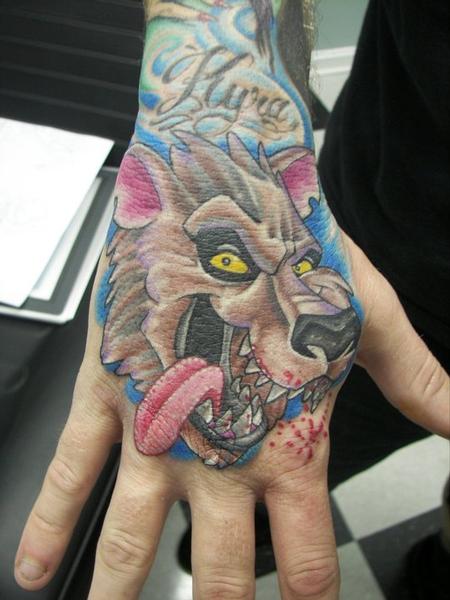 Jeff Stevens - Wolf Hand Tattoo