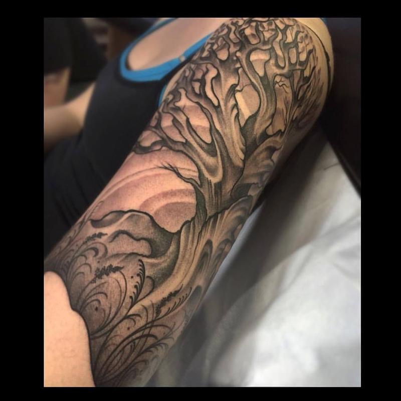 Black and grey tree half sleeve by Laura Jade Tattoos