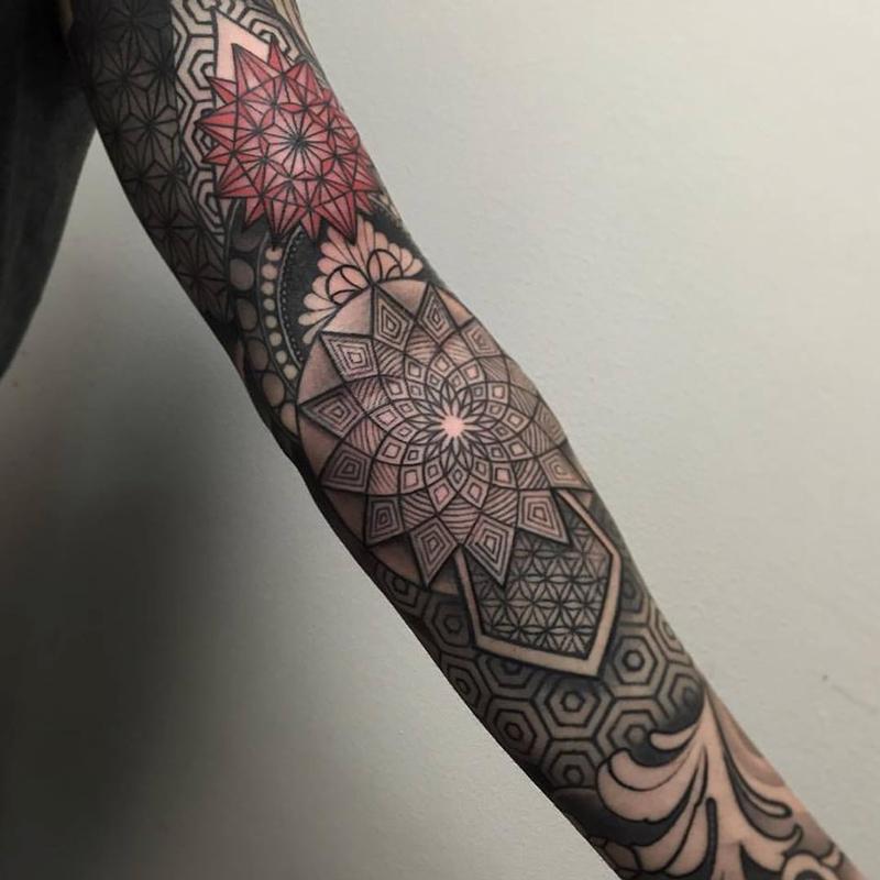 Geometric sleeve tattoo by Laura Jade: TattooNOW