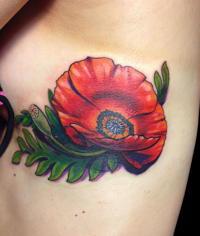 Poppy Flower on Ribs by Nicole Laabs TattooNOW
