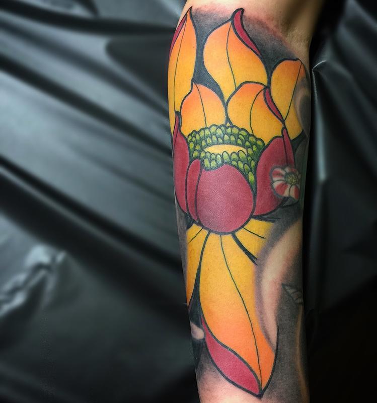 Lotus flower by Stephen Sanchez TattooNOW