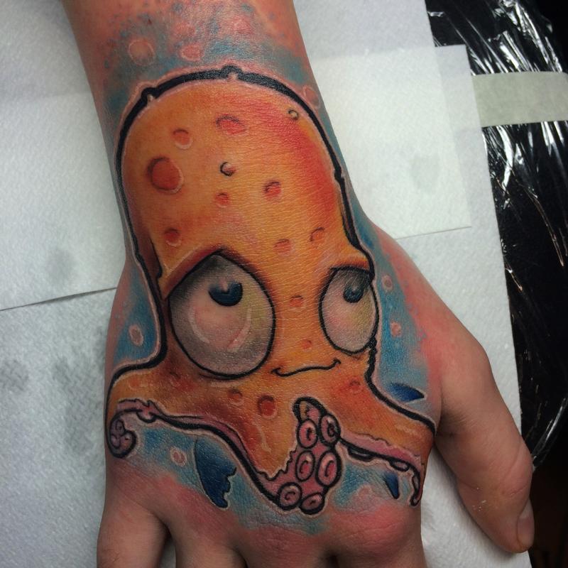 hand squid tattoo by Tony Boufandene: TattooNOW