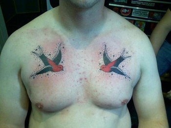 Tattoos - swallows on chest - 47971