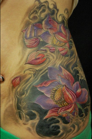 side piece tattoos of flowers