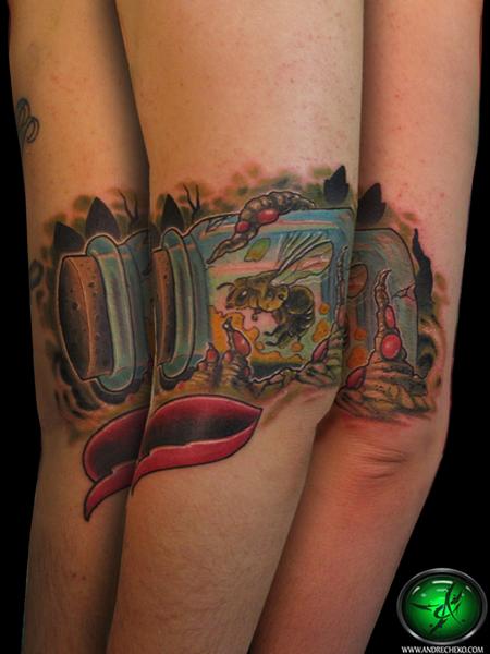 Andre Cheko - Captured honey bee tattoo