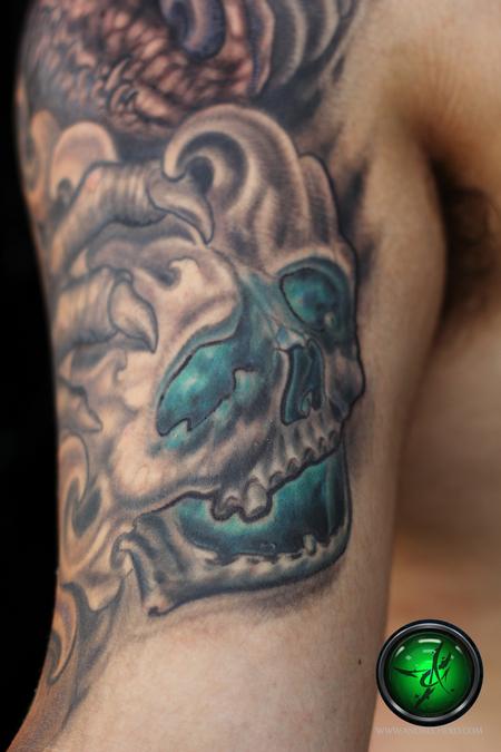 Tattoos - Dragon head and skull tattoo - close up - 78491
