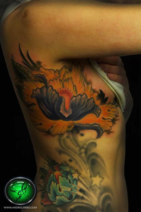 Andre Cheko - Japanese flower rib color tattoo