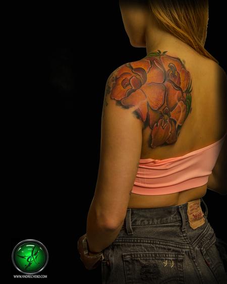 Andre Cheko - female floral orchid color tattoo