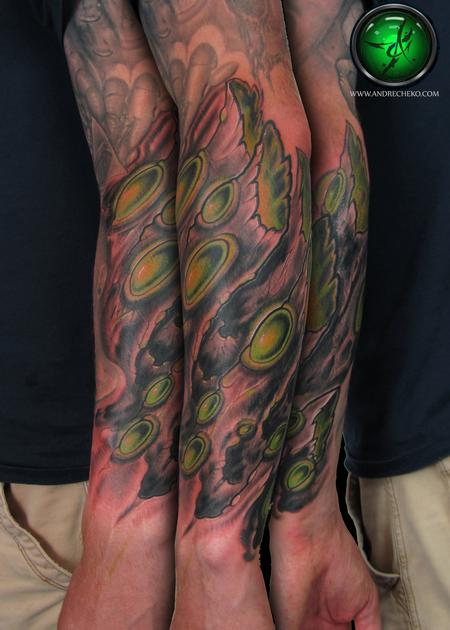 Andre Cheko - Organic tree bark glow arm tattoo