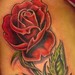 Tattoos - rose on the ribs - 48451