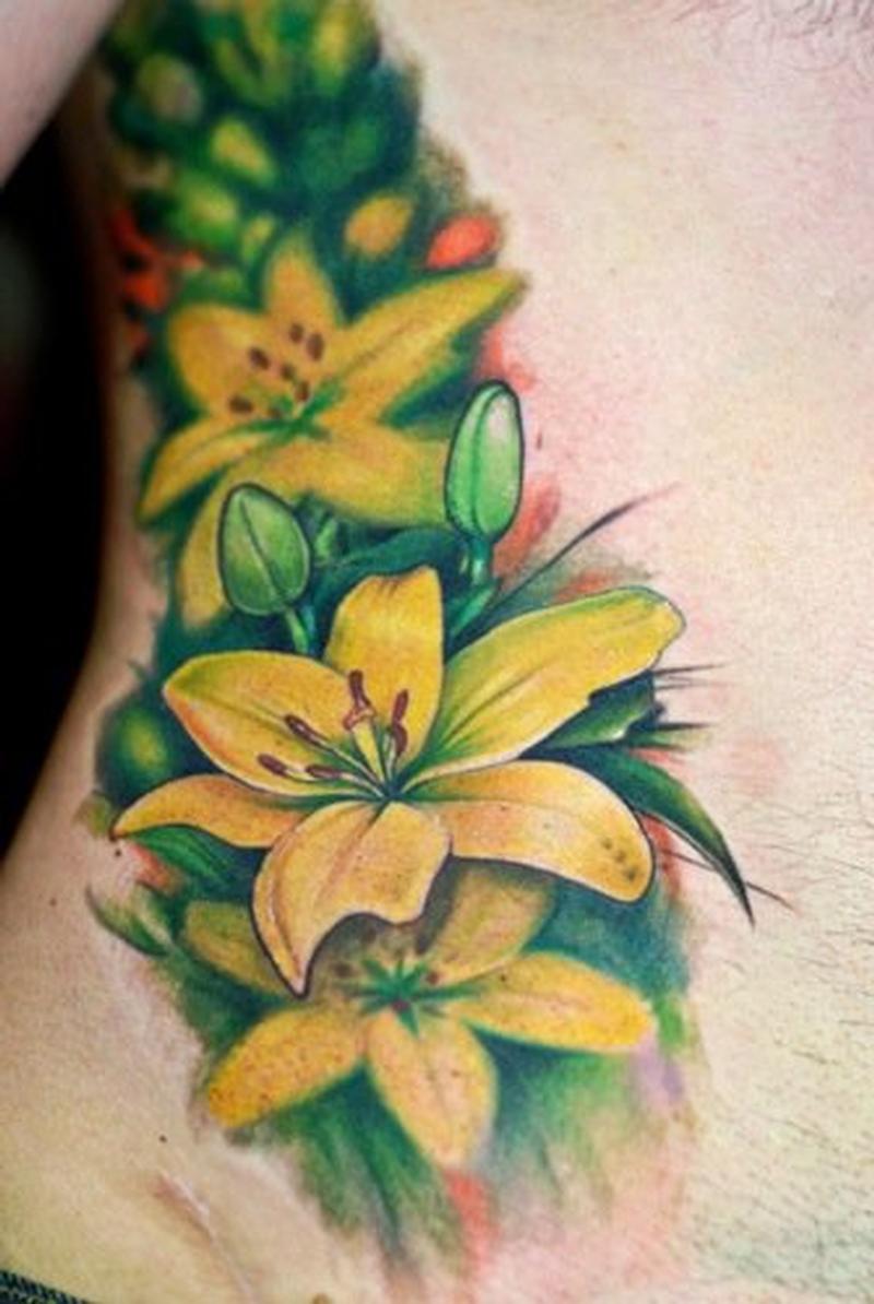 Yellow flowers tattoo by Bez TattooNOW