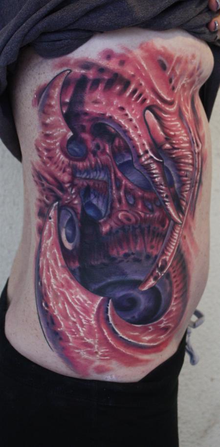 Ty McEwen - bio organic rib tattoo