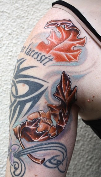 Ty McEwen - acorn and fall leaf tattoo