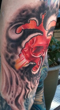 Ty McEwen - bio organic glowing skull tattoo