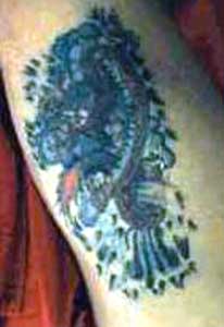 Really bad tattoo - Dragon w/ water
