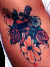 Really bad tattoo - Dagger and flowers