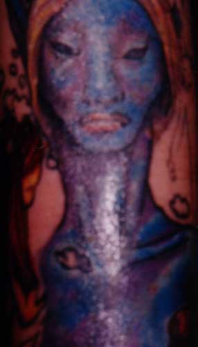 Really bad tattoo - Blue face