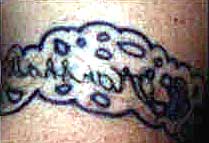 Really bad tattoo - Swiss Cheese  w/ Name