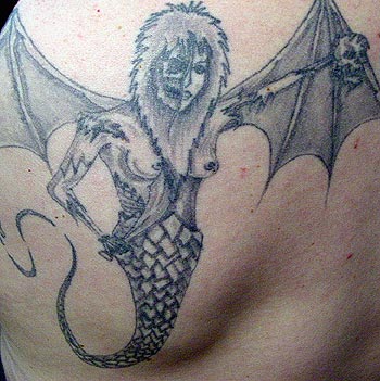 Really bad tattoo - Mermaid w/ wings