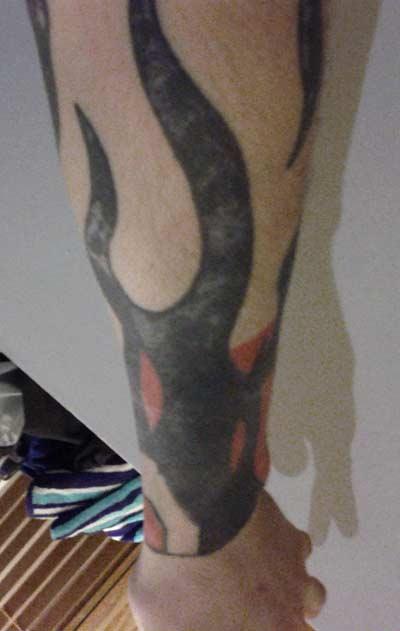 Really bad tattoo - free tribal flames tattoo