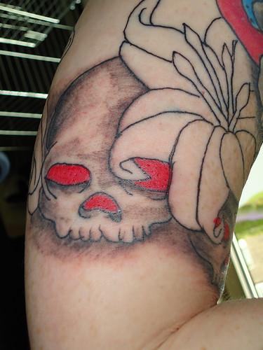 Bad Tattoos - Skull and flowers tattoo