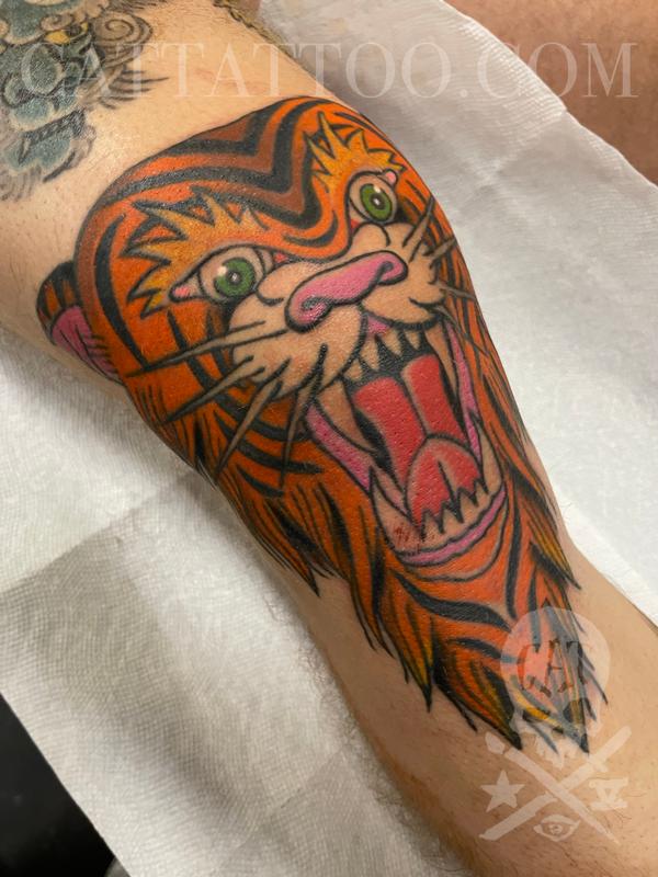 Tiger knee cap by Justin Gorbey TattooNOW