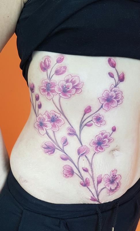 Delicate Feminine Cherry Blossoms Rib Tattoo by Steve Malley: TattooNOW