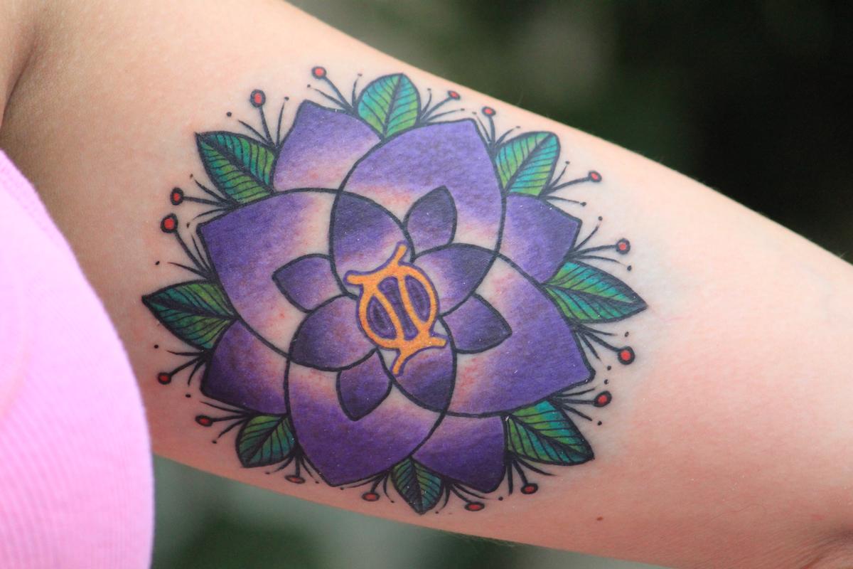Purple flower gemini by Patrick Sweeney TattooNOW