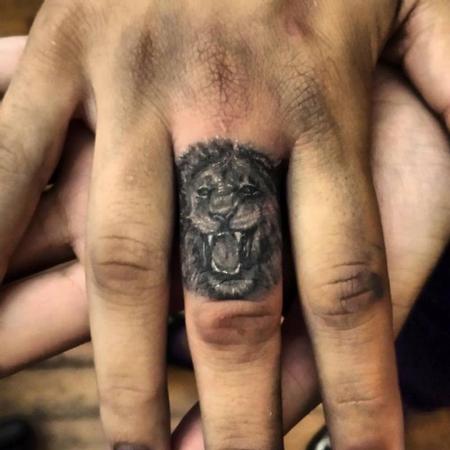 Tattoos - lion finger tattoo - 97827