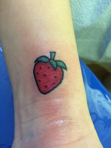 tiny strawberry tattoo by Jen Godfrey: TattooNOW